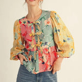 Ellie Peplum Top